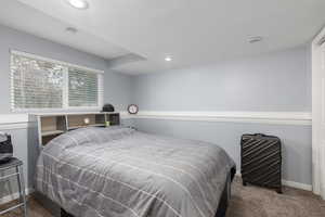 View of carpeted bedroom