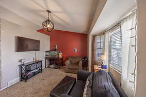 Wonderful natural light from bay box window in living room.