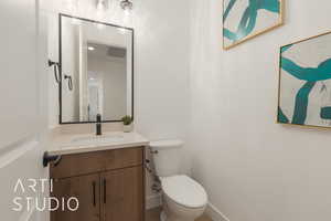 Bathroom with toilet and vanity