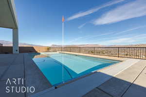 View of pool featuring a mountain view