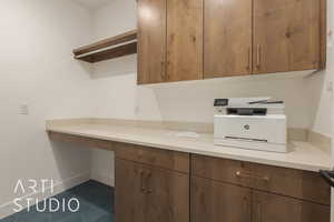 Kitchen with dark tile patterned flooring