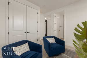 Sitting room with carpet flooring