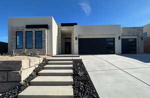 Contemporary house featuring a garage