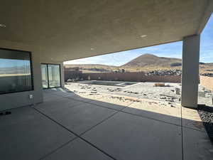 View of patio / terrace with a mountain view