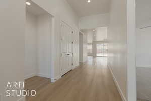 Hallway featuring light hardwood / wood-style floors