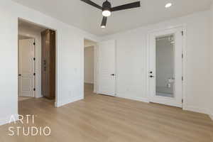 Unfurnished bedroom featuring ceiling fan and light wood-type flooring