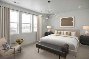 Carpeted bedroom featuring an inviting chandelier