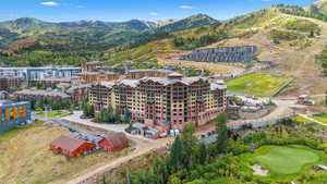 Birds eye view of property with a mountain view