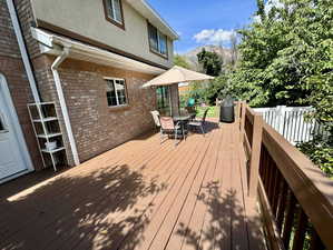 Deck (12x28) with a mountain view