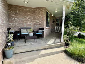 View of patio / terrace with a porch