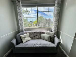 Master bedroom featuring room for a couch or office area.