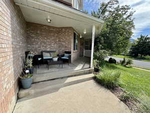 View of patio with covered porch