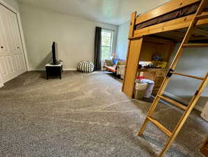 Huge bedroom with 2 closets and 2 windows.