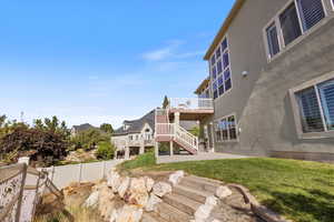 View of yard with a wooden deck