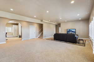 Living room with light colored carpet