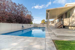 View of pool featuring a covered patio