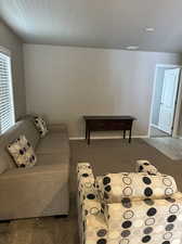 Living room featuring carpet flooring