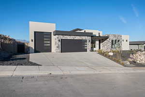 View of front of property with a garage