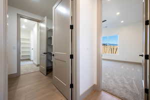 Hallway featuring light hardwood / wood-style floors