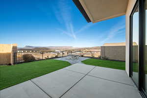 View of patio / terrace with a mountain view