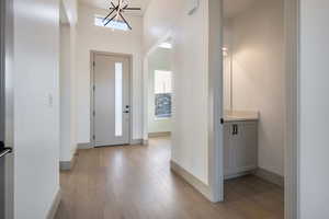 Foyer entrance with light hardwood / wood-style flooring