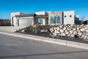 View of front of home with a garage