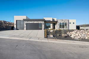 View of front of home with a garage