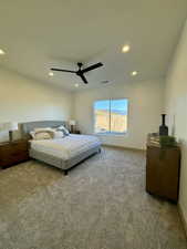 Carpeted bedroom with ceiling fan