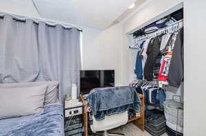 Walk in closet featuring carpet floors