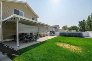 View of yard with a patio area