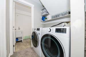 Clothes washing area with washing machine and dryer