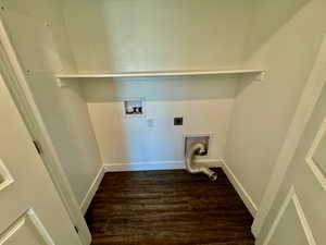 Washroom featuring washer hookup, hookup for an electric dryer, and dark wood-type flooring