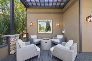 Secluded outdoor lounging nook on back deck w/ propane gas fire pit.