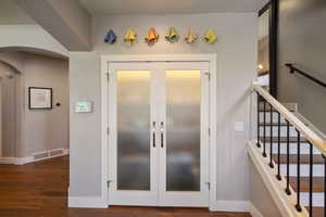 Frosted glass paneled dinette closet off of open space semi formal dining area.