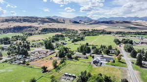 Bird's eye view featuring a rural view and a mountain view