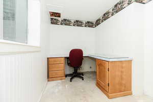 Unfurnished office with built in desk