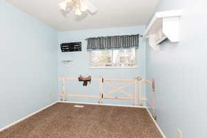 Empty room featuring carpet floors