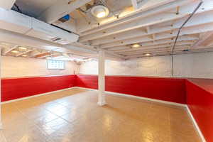 Basement with tile patterned floors