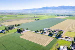 Aerial view featuring a mountain view and a rural view