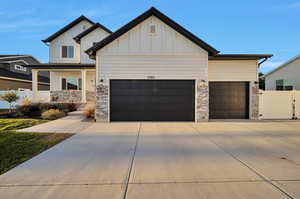 View of front of house featuring 3 car garage