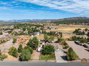 Drone / aerial view featuring a mountain view