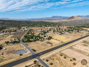 Birds eye view of property with a mountain view