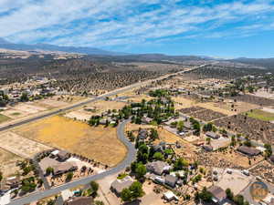 Birds eye view of property featuring a mountain view