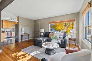 Living room with hardwood / wood-style floors