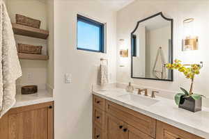 Primary bathroom with dual vanities