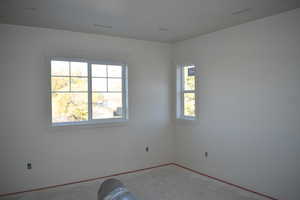 Unfurnished room with concrete floors