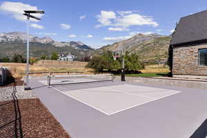 View of sport court with a mountain view