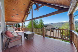 Wooden deck featuring a mountain view