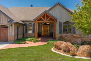 View of front of house featuring a covered porch