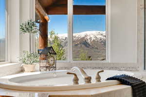 Primary Bathroom with a mountain view, jetted tub